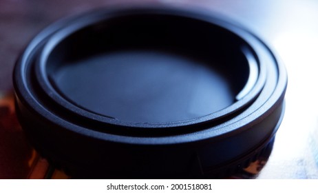Black ring on the table by the window