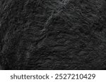 Black rock or lava rock texture. Closeup. Premium background podium. 