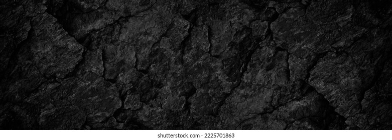 Black rock texture  Rough mountain surface and cracks  Close  up  Dark stone background and space for design  Grunge  Banner  Wide  Long  Panoramic  