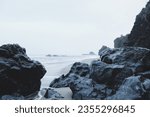 black rocks on the beach of Tasmanian sea
