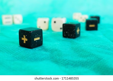 
Black Role-playing Dice (from The Fate Plus And Minus System) With A Green Background