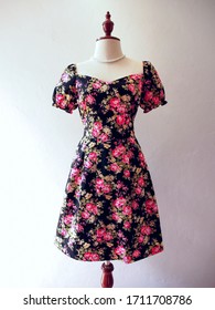 Black rose dress blossom floral vintage inspired dress on mannequin fluffy sleeve bodice retro fashion women clothing seamstress neat handmade stitch dress summer female fashion outfit 