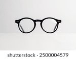 Black round glasses isolated on white background. Plastic glasses frame. Bold glasses frame.