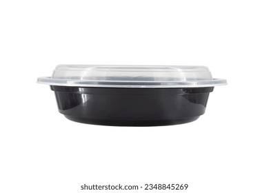 A black rounded food tray isolated on white background