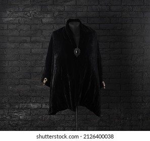 Black Royal Robe On A Black Background