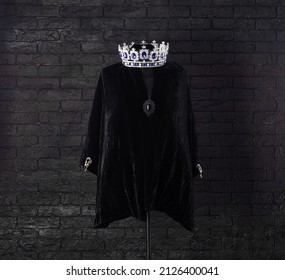 Black Royal Robe On A Black Background