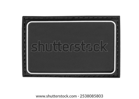 Black rubber blank stitched patch isolated on white background
