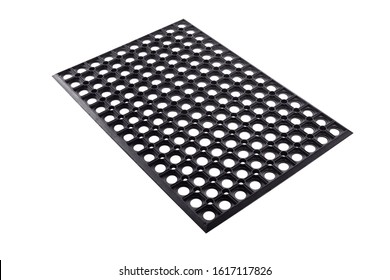 Black Rubber Entrance Mat Isolated On White Background. Cellular Rubber Mat For Dirt Removal. Welcome Carpet, Close Up