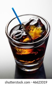 Black Russian Mixed Drink On A Grey Background With Reflection