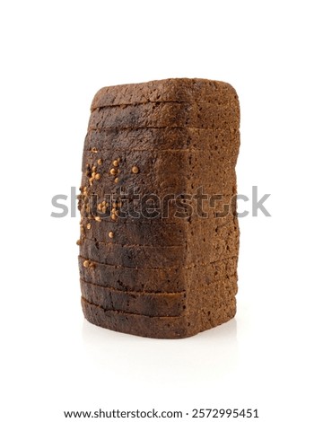 Black rye bread isolated, dark brown sliced loaf, sourdough borodinsky rugbrod square slices with coriander on white background