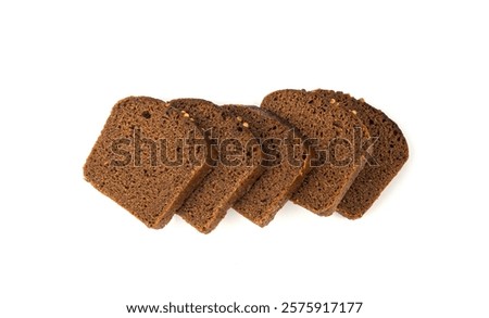 Black rye bread isolated, dark brown sliced loaf, sourdough borodinsky rugbrod square slices with coriander on white background