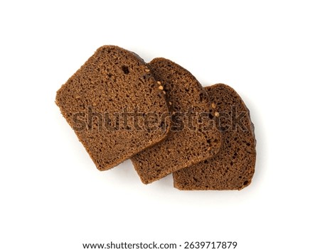 Black rye bread isolated, dark brown sliced loaf, sourdough borodinsky rugbrod square slices with coriander on white background
