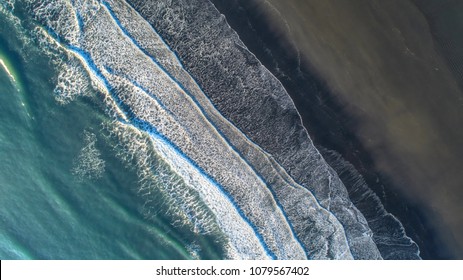 The black sand beach in Iceland. Sea aerial view and top view. Amazing nature, beautiful backgrounds and colors. - Powered by Shutterstock