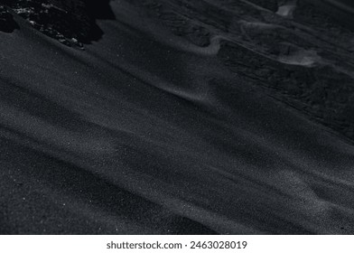 Black Sand dune. Black Sand beach macro photography. Background, texture, wave, black. Texture of beach sand. Black beach. - Powered by Shutterstock