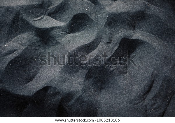Black sand floor texture from above. Interior,\
exterior design ideas