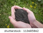 Black sand in hands