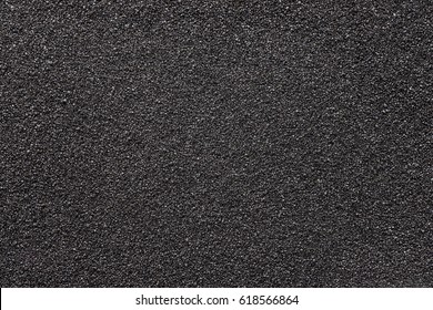 Black sand. Texture and background