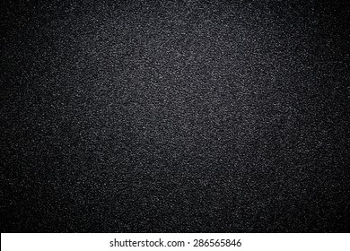 Black Sandpaper Texture Background.