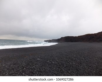 black sandy beach