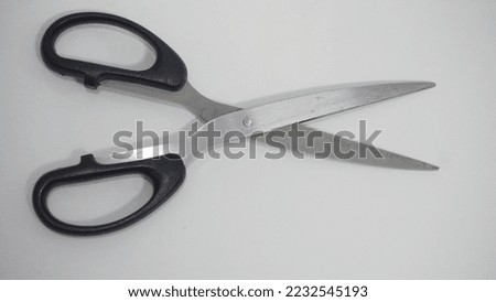 black scissor with isolated white background