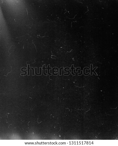 Black scratched grunge background, scary distressed horror texture, old film effect