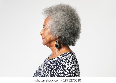 Black senior woman with afro hair in a profile shot
