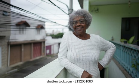 A Black Senior Woman Portrait Standing Outside Smiling At Camera