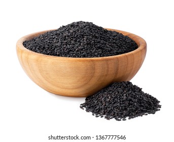 black sesame seeds in wooden bowl isolated on white background - Shutterstock ID 1367777546