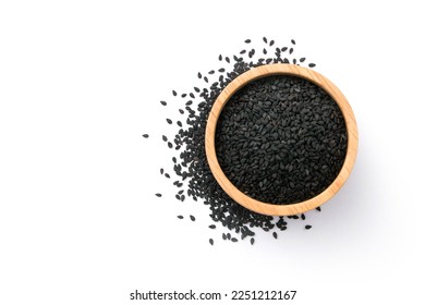 Black sesame seeds in wooden bowl with floor isolated on white background , top view , flat lay.