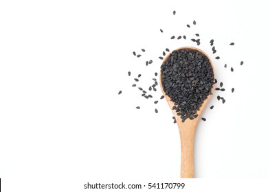 Black sesame seeds in wooden spoon - Shutterstock ID 541170799