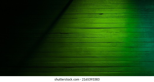 Black Shadow Reflected On Green Wooden Surface. Dark Green Wood Texture