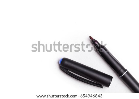 Black sharpie marker.