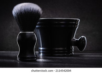 Black Shaving Brush With Bowl On Dark Background Close Up View