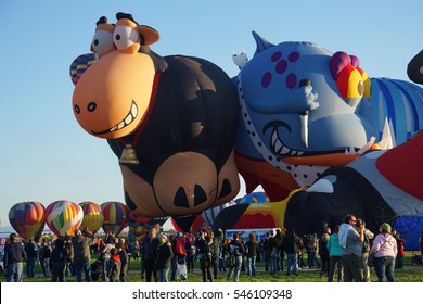 The Black Sheep And The Piranha. October 3, 2015, Albuquerque International Balloon Fiesta.  The Piranha Balloon Was Ready For Actions While The Black Sheep Balloon Had A Sheepish Grin.