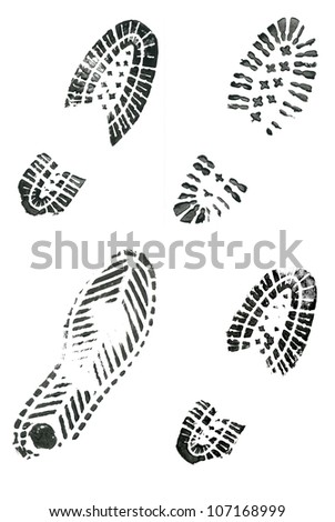 Black shoe prints on white background