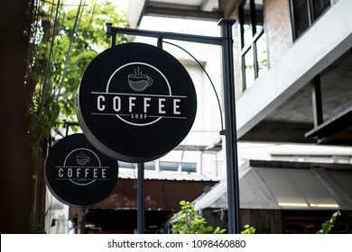 Black Sign Outside A Restaurant Mockup