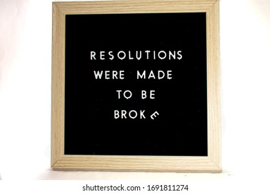 A Black Sign With White Letters That Says Resolutions Were Made To Be Broke On A White Background With A Broken Letter E