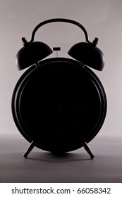 Black Silhouette Of Alarm Clock