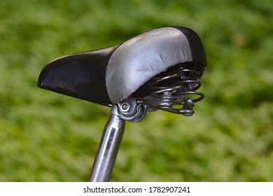spring loaded bicycle seat
