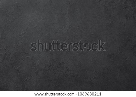 Black slate or stone texture background, horizontal