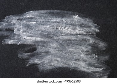 black slate white chalk smeared. blackboard chalk spot.