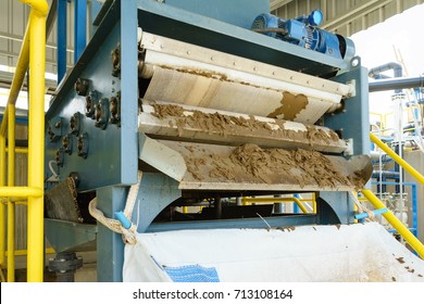 Black Sludge Disposal From Wastewater Treatment In White Plastic Bag