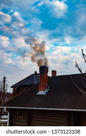 Black smoke on blue sky background - Shutterstock ID 1373123108