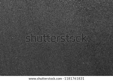 Black smooth asphalt road texture background top view