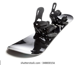 Black Snowboard With Bindings On White Background