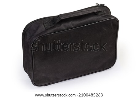 Black soft case for equipment and accessories in the form of a small rectangular flat textile bag with zipper and strap handle on a white background
