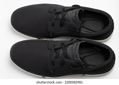Black Soft Pair Shoes Above Top View Isolated On Studio Background