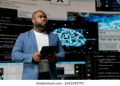 Black software expert focusing on programming language for innovation, reading binary code on terminal window. Reviews code development for data science. Modern futuristic coding life.