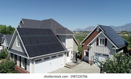 Black Solar Panels On Roof Of Home. Electricity Reduced From High Quality Black Solar Panel Installation