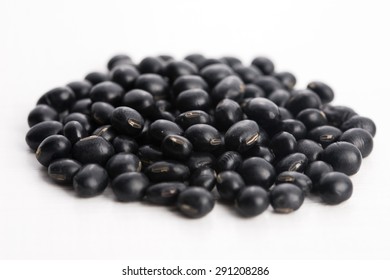 A Lot Of Black Soybeans On Wooden Background